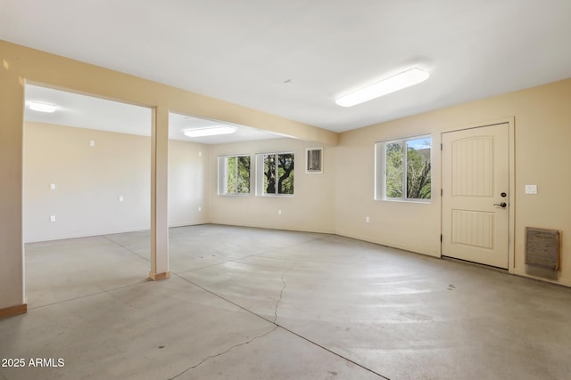 6602 W Dogwood Ln, Pine, AZ 85544 - unfurnished room with plenty of natural light and concrete flooring