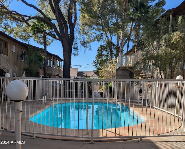 view of pool with a patio area