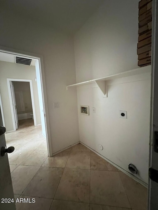 3030 S 102nd Ln, Tolleson, AZ 85353 - washroom featuring washer hookup, light tile patterned floors, hookup for a gas dryer, and hookup for an electric dryer
