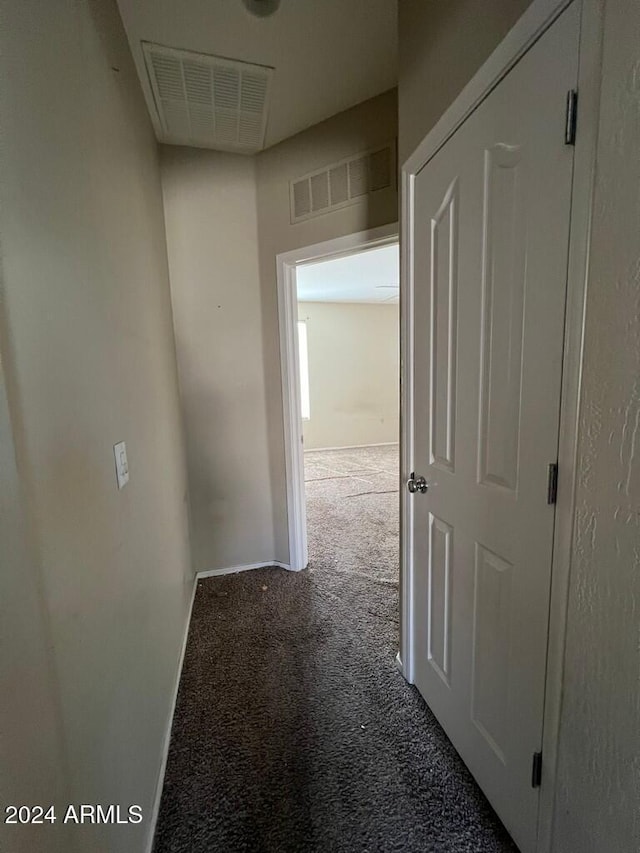 3030 S 102nd Ln, Tolleson, AZ 85353 - corridor featuring carpet floors and baseboards