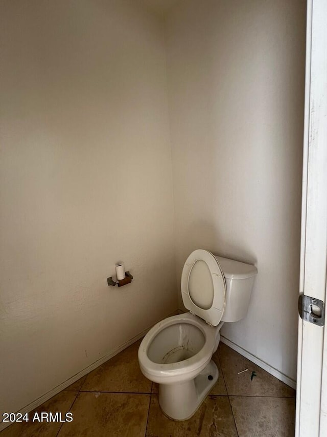 3030 S 102nd Ln, Tolleson, AZ 85353 - bathroom featuring tile patterned flooring and toilet