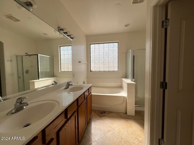 3030 S 102nd Ln, Tolleson, AZ 85353 - full bath with a garden tub, a shower stall, double vanity, and tile patterned floors