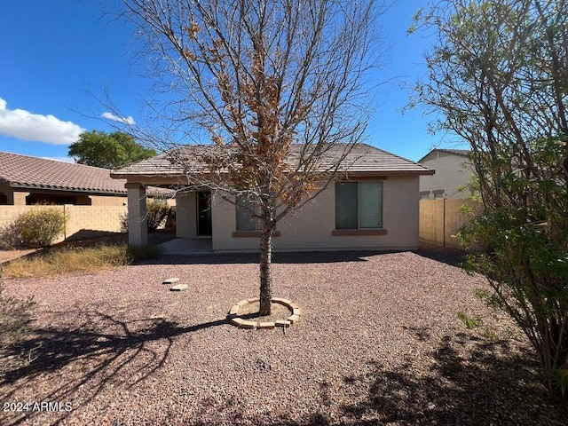 3030 S 102nd Ln, Tolleson, AZ 85353 - back of property with stucco siding and a tile roof