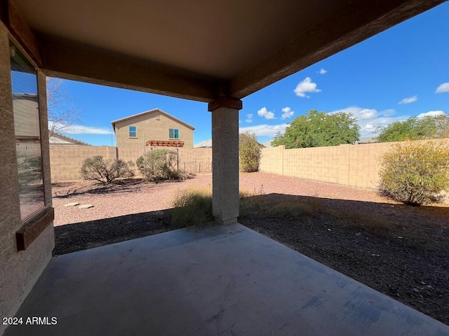 3030 S 102nd Ln, Tolleson, AZ 85353 - fenced backyard with a patio area