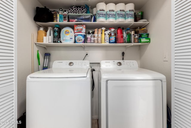 laundry room featuring washing machine and clothes dryer