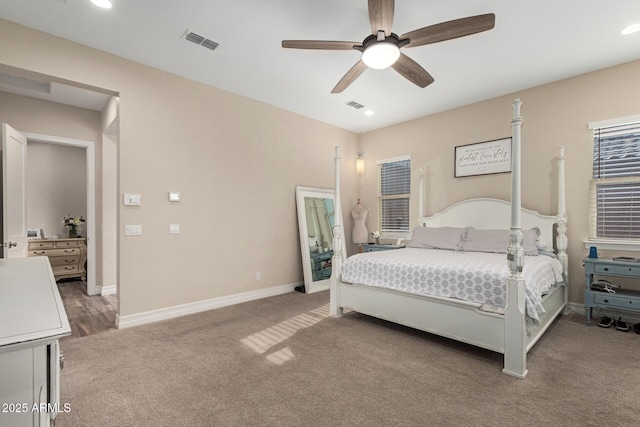 carpeted bedroom with ceiling fan