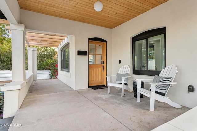 view of patio / terrace featuring a pergola