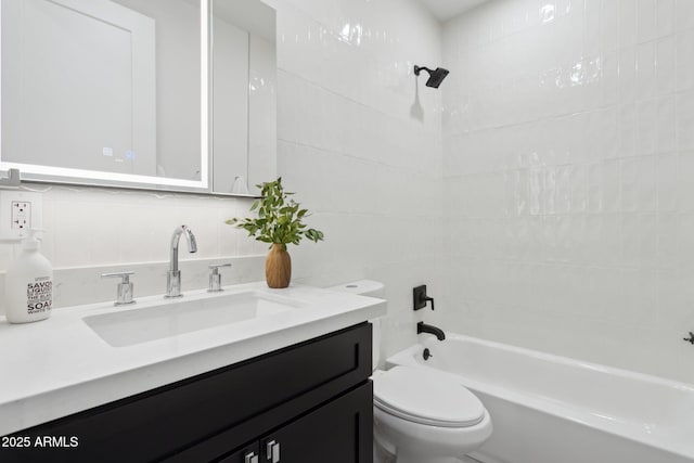 full bathroom featuring vanity, toilet, bathing tub / shower combination, and backsplash