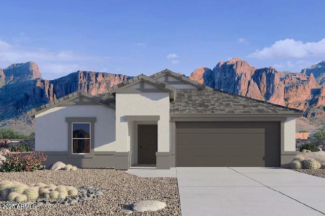 single story home with a garage and a mountain view