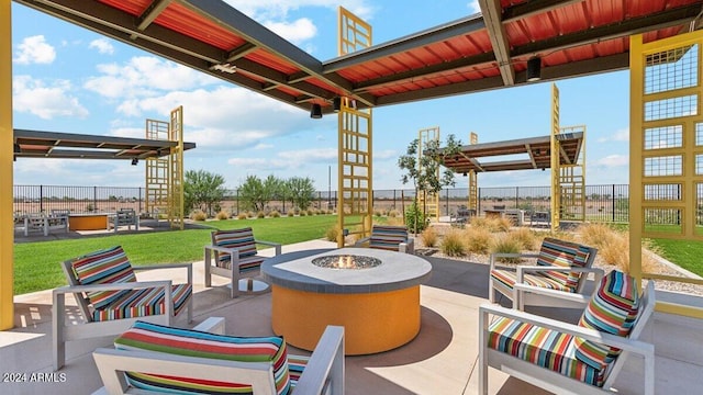 view of patio / terrace featuring an outdoor fire pit