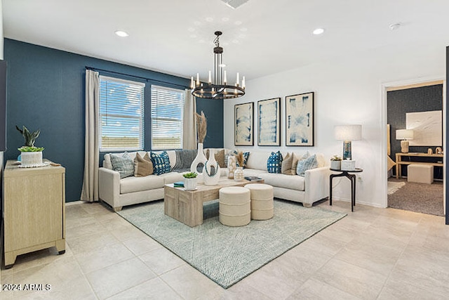 living room with light tile patterned flooring and a notable chandelier