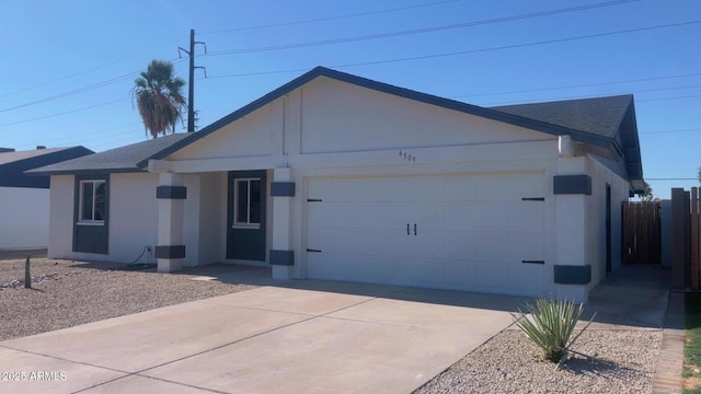 4509 E La Puente Ave, Phoenix, AZ 85044 - ranch-style home featuring a garage, a shingled roof, concrete driveway, and stucco siding