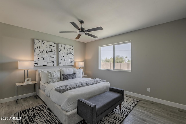 4509 E La Puente Ave, Phoenix, AZ 85044 - bedroom featuring wood finished floors, baseboards, and ceiling fan