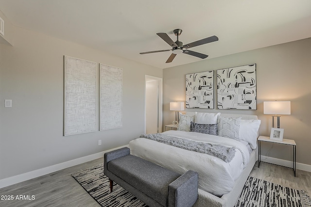 4509 E La Puente Ave, Phoenix, AZ 85044 - bedroom with wood finished floors, baseboards, and a ceiling fan