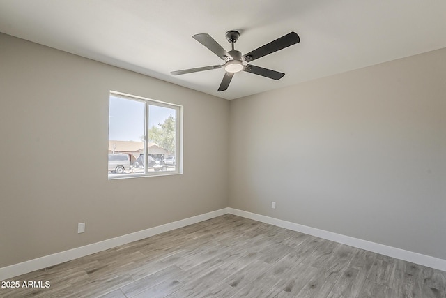 4509 E La Puente Ave, Phoenix, AZ 85044 - unfurnished room featuring light wood-type flooring, ceiling fan, and baseboards