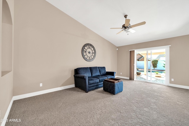 sitting room featuring lofted ceiling, ceiling fan, and carpet flooring