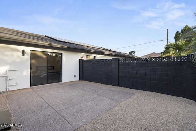 view of patio / terrace with fence