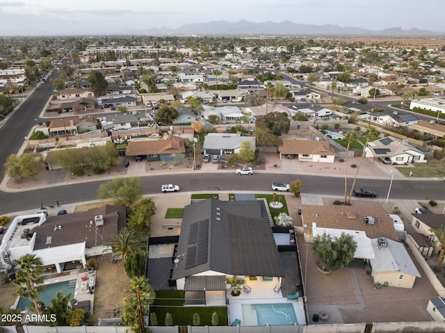 bird's eye view with a residential view and a mountain view