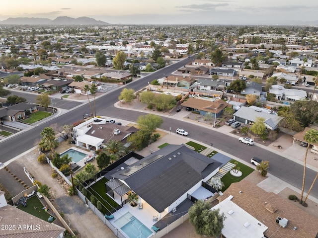 birds eye view of property featuring a residential view and a mountain view