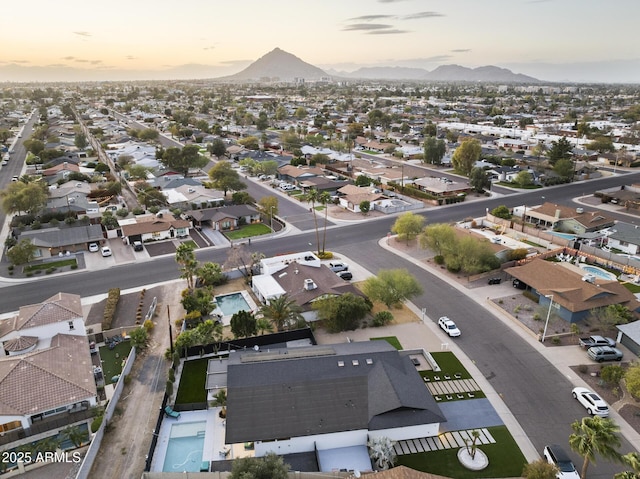 bird's eye view featuring a residential view and a mountain view