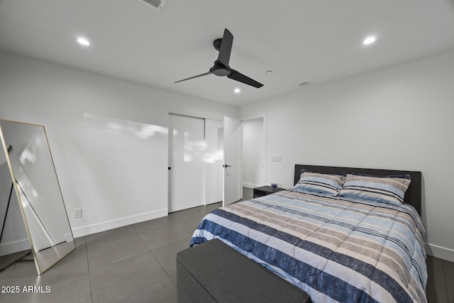 bedroom with ceiling fan, baseboards, a closet, and recessed lighting