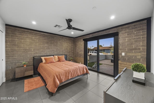 bedroom featuring access to outside, visible vents, brick wall, and recessed lighting