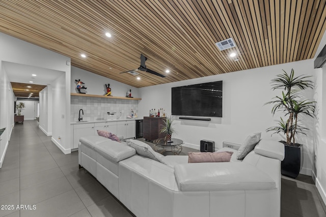 living area with lofted ceiling, wooden ceiling, recessed lighting, visible vents, and wet bar