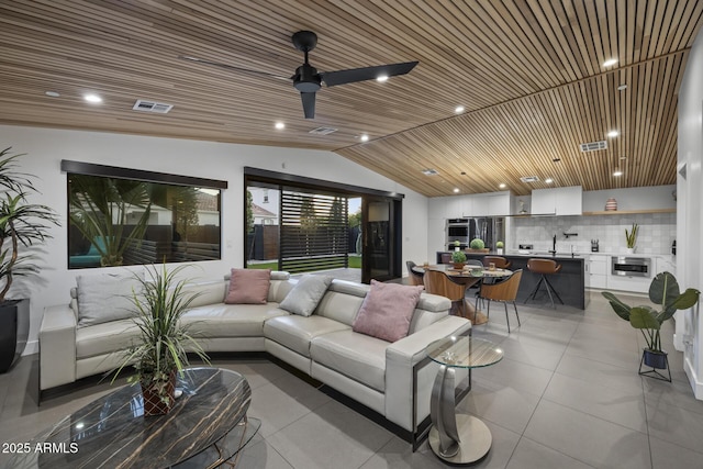 living room featuring light tile patterned floors, visible vents, wood ceiling, vaulted ceiling, and recessed lighting