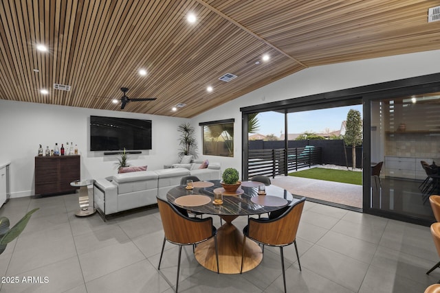 dining room with wooden ceiling, visible vents, vaulted ceiling, and light tile patterned flooring