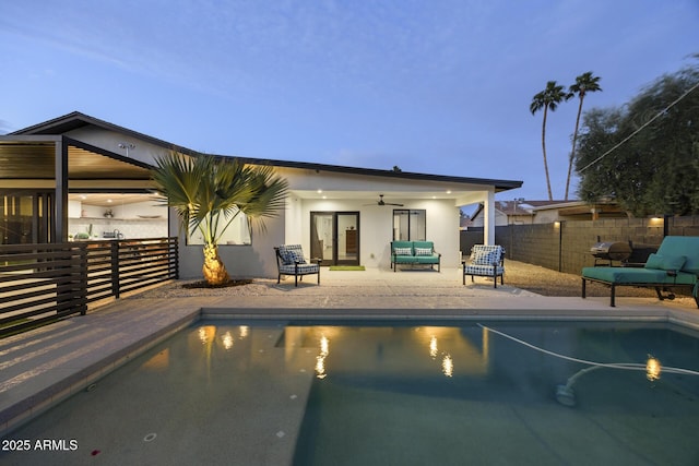 view of pool with ceiling fan, a patio, fence, grilling area, and a fenced in pool