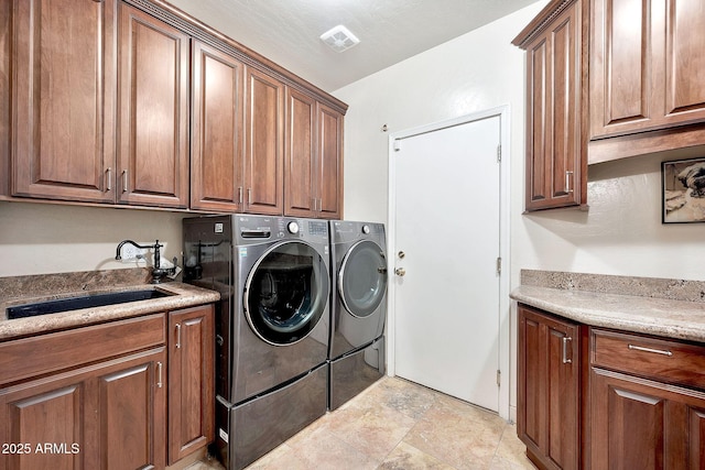 15413 S 31st Pl, Phoenix, AZ 85048 - laundry room with washing machine and clothes dryer, cabinet space, visible vents, and a sink