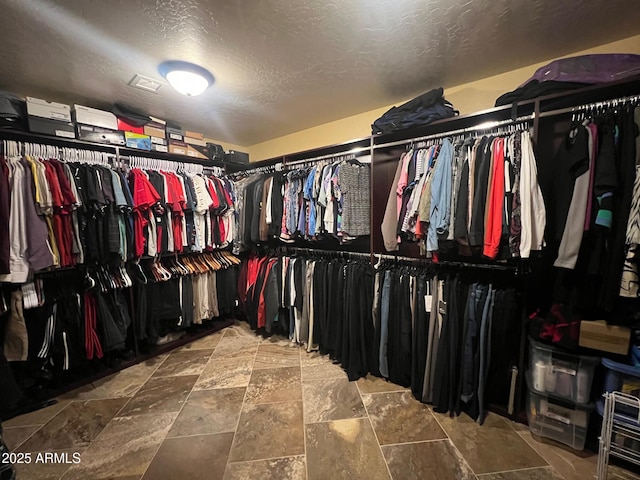 15413 S 31st Pl, Phoenix, AZ 85048 - spacious closet featuring stone finish flooring