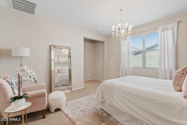 carpeted bedroom with an inviting chandelier, baseboards, and visible vents