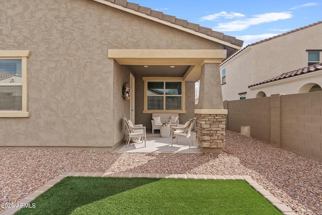 exterior space with fence and stucco siding