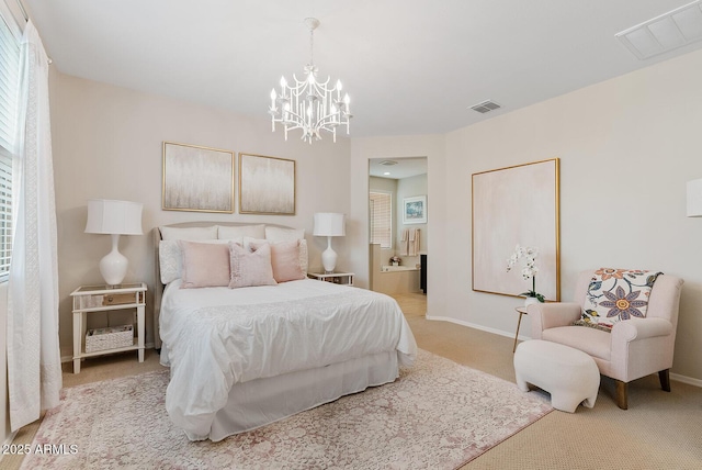 bedroom featuring light colored carpet, visible vents, baseboards, and ensuite bathroom