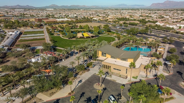 birds eye view of property with a mountain view