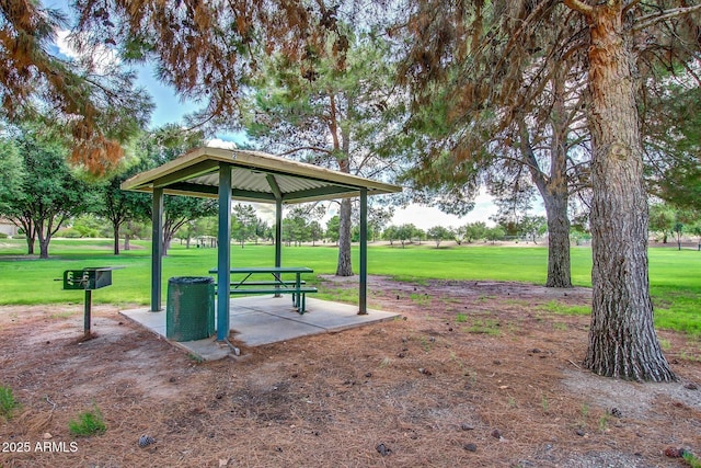 surrounding community with a gazebo and a lawn