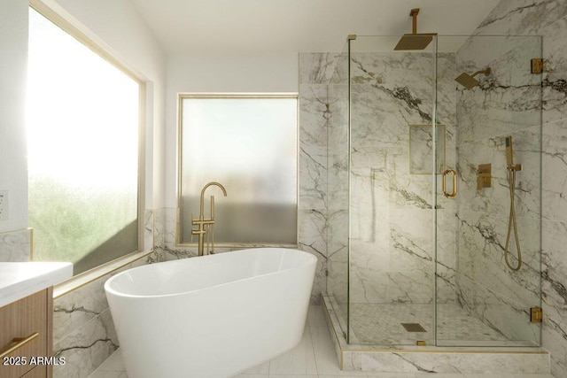 bathroom with vanity, tile patterned flooring, and independent shower and bath