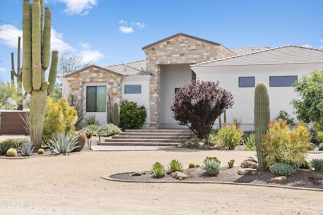 6133 E Dixileta Dr, Cave Creek, AZ 85331 - view of front of home featuring stone siding, stucco siding, and a tiled roof