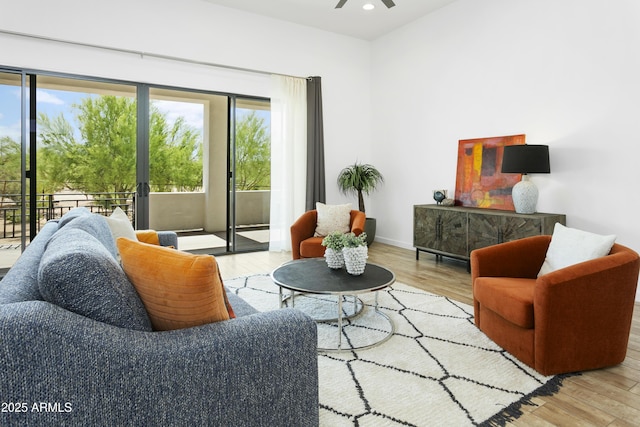 6133 E Dixileta Dr, Cave Creek, AZ 85331 - living room featuring wood finished floors, a ceiling fan, and recessed lighting