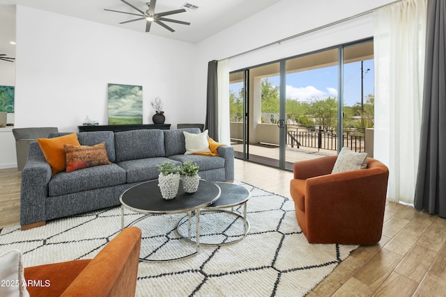 6133 E Dixileta Dr, Cave Creek, AZ 85331 - living area featuring ceiling fan and wood finished floors