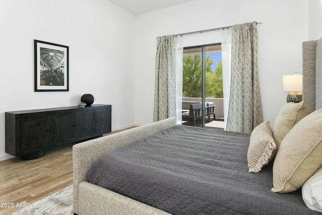 6133 E Dixileta Dr, Cave Creek, AZ 85331 - bedroom with access to outside and wood finished floors