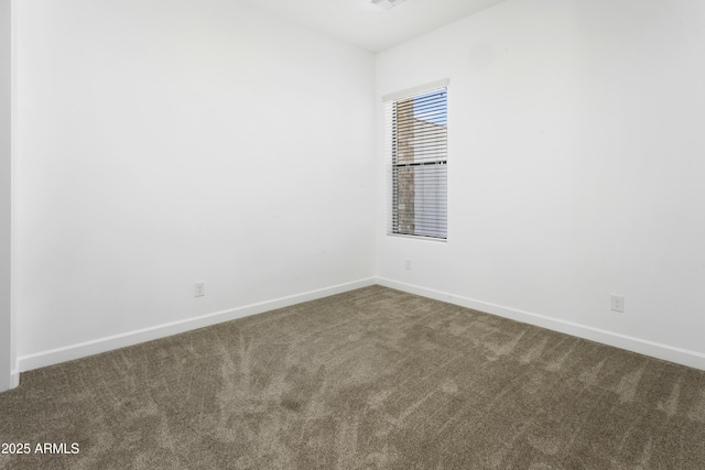 6133 E Dixileta Dr, Cave Creek, AZ 85331 - carpeted empty room with baseboards