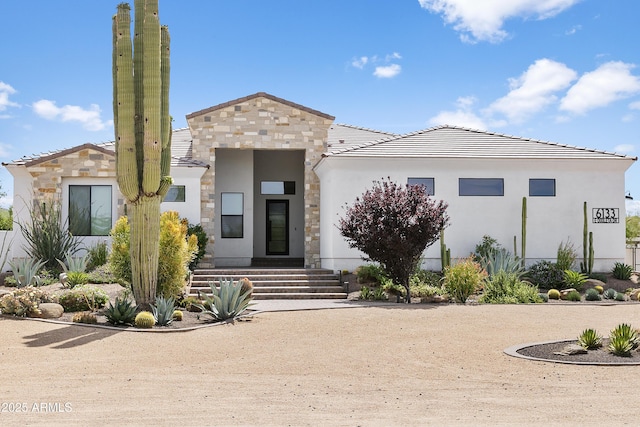 6133 E Dixileta Dr, Cave Creek, AZ 85331 - contemporary home with stone siding, stucco siding, and a tiled roof