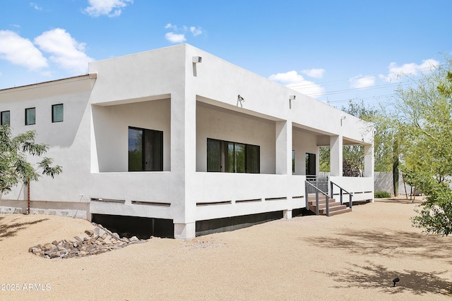6133 E Dixileta Dr, Cave Creek, AZ 85331 - view of home's exterior featuring stucco siding and covered porch