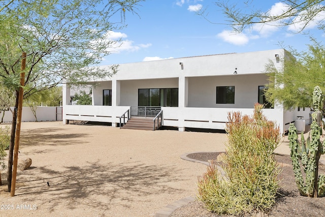 6133 E Dixileta Dr, Cave Creek, AZ 85331 - back of property with stucco siding and a porch