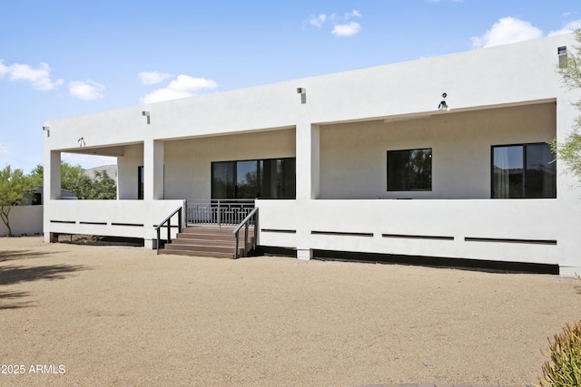 6133 E Dixileta Dr, Cave Creek, AZ 85331 - back of property featuring stucco siding and a porch
