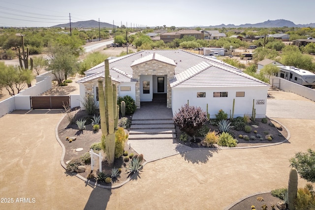 6133 E Dixileta Dr, Cave Creek, AZ 85331 - view of front facade with stucco siding, a mountain view, and a tiled roof