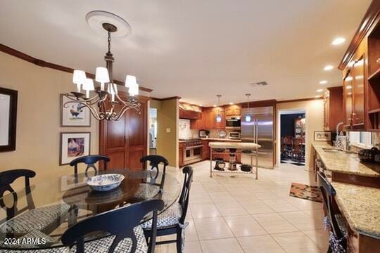 tiled dining room with an inviting chandelier, crown molding, and sink