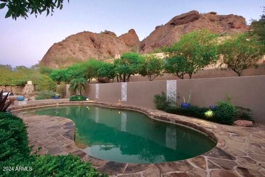 view of pool with a mountain view